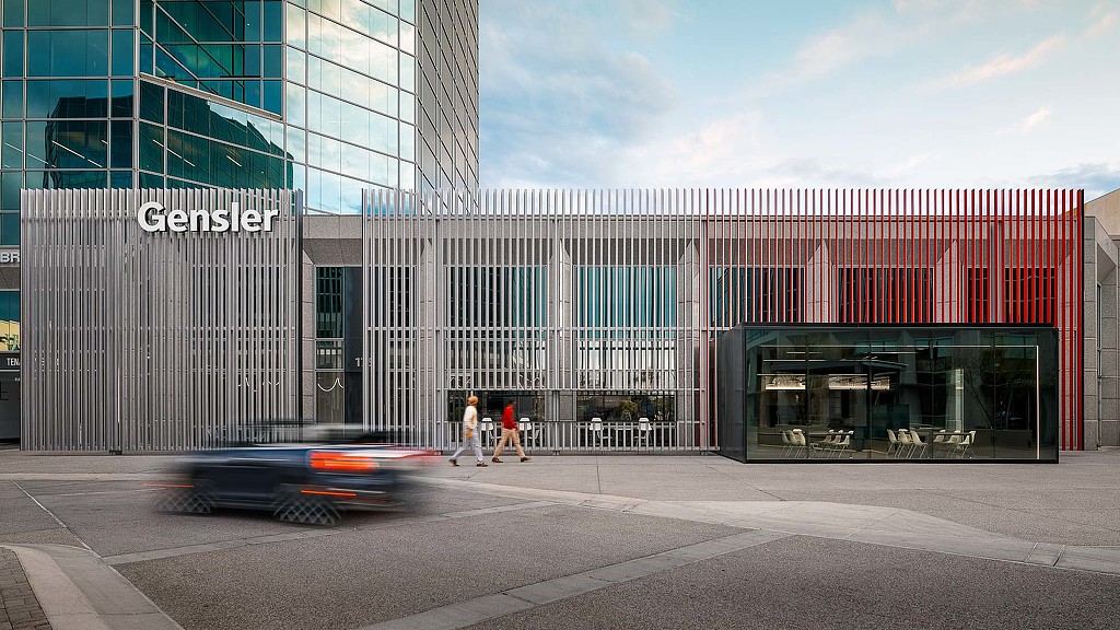 A car parked outside a building.