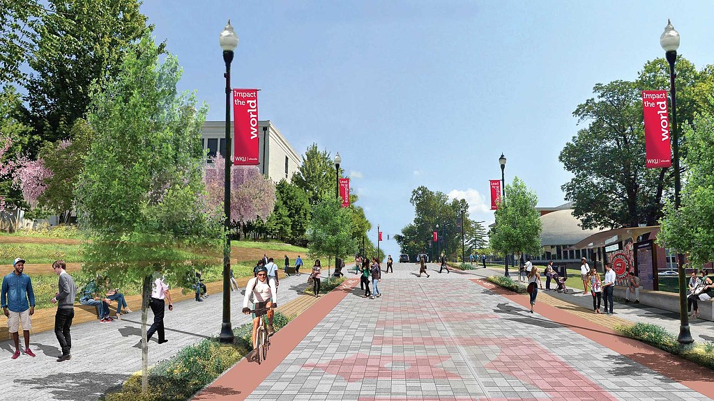 People walking on a brick path.
