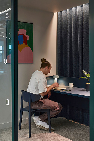 A man sitting at a desk.