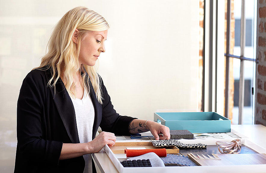 A woman sitting at a table.