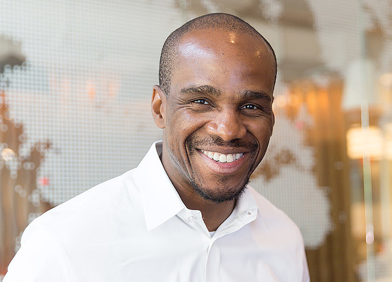 A headshot of Tony Okoye