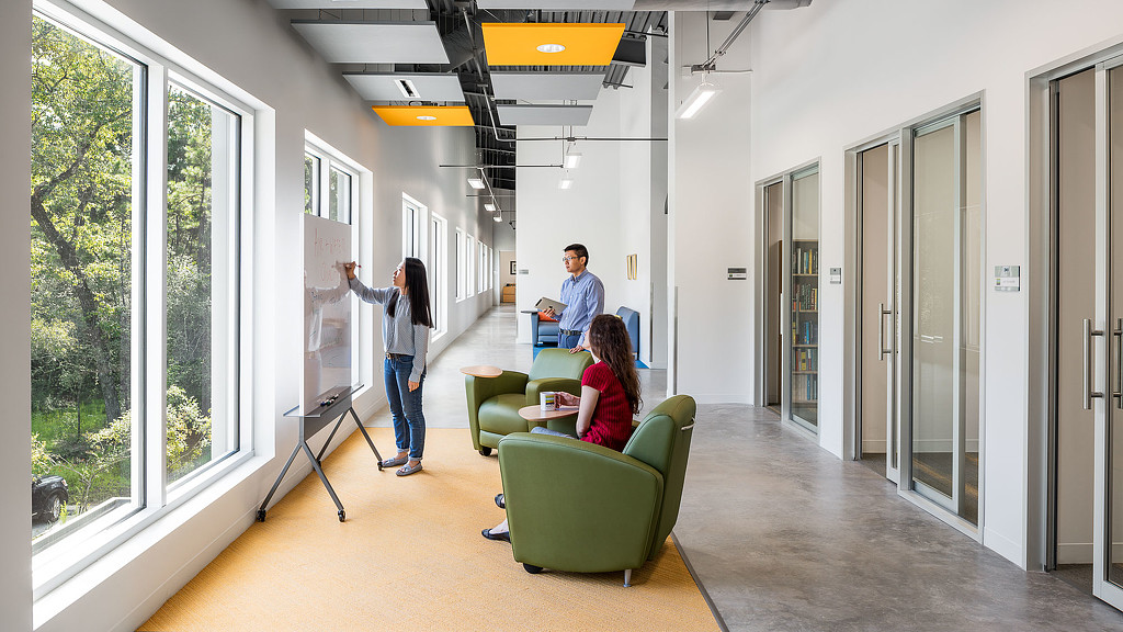 A group of people in a room.