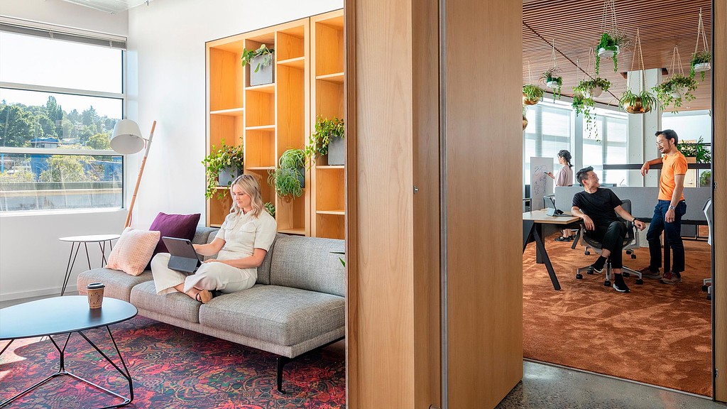 A group of people sitting in a room.