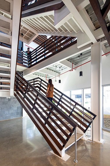 A person standing on a staircase.