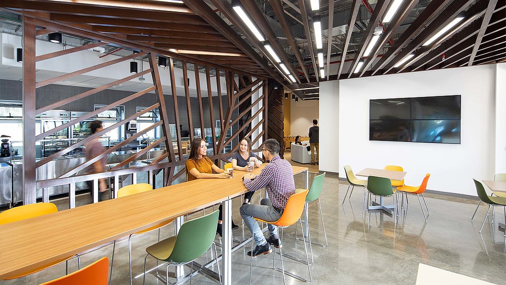 A group of people sitting at a table.