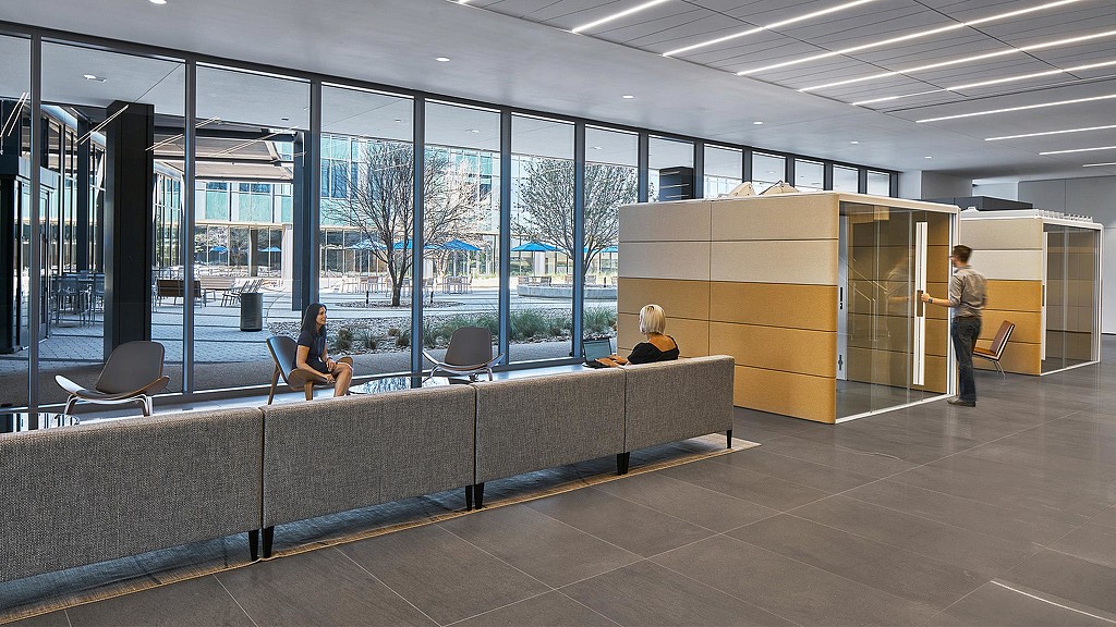 Corporate campus lounge area with focus rooms