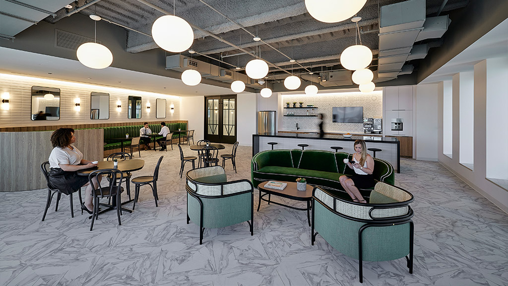 A group of people sitting at tables.