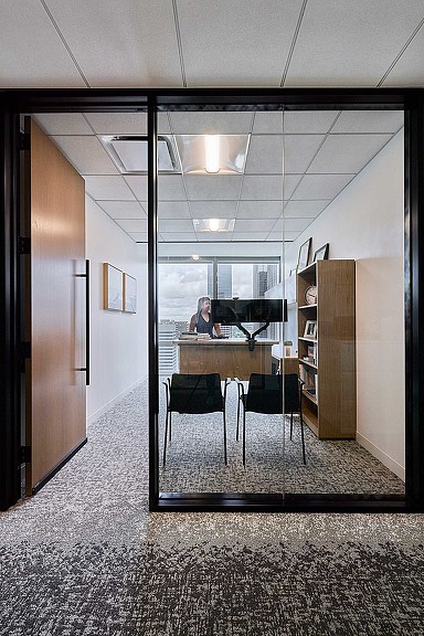 A room with a table and chairs.