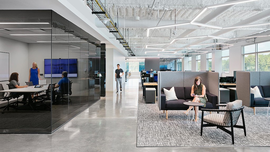 Workplace meeting room, workstations, and lounge seating