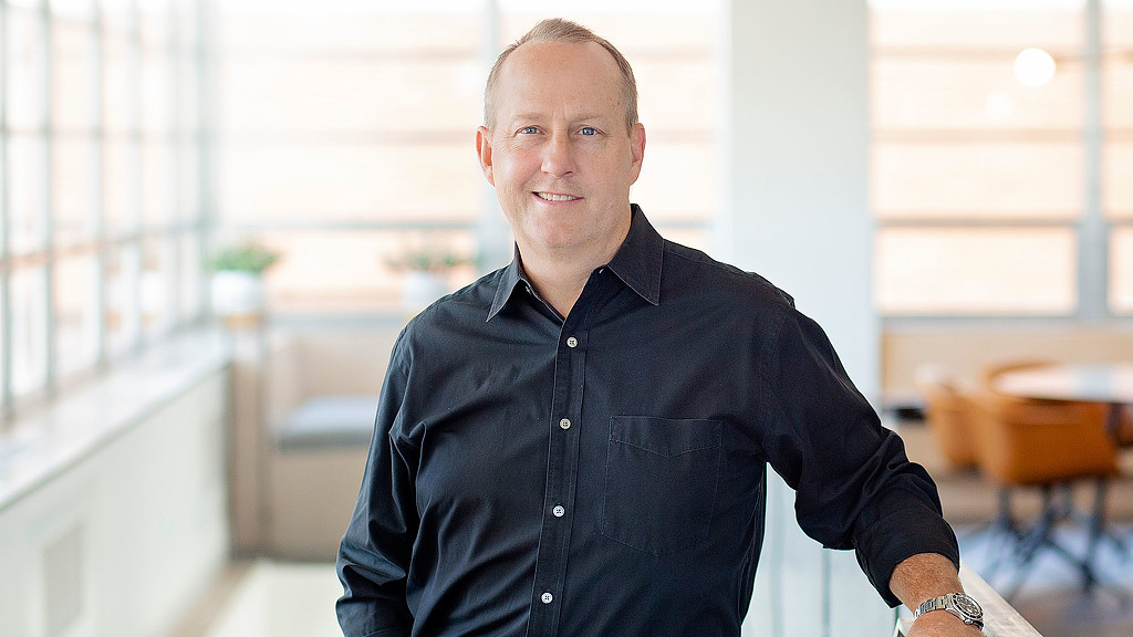 A man in a black shirt.