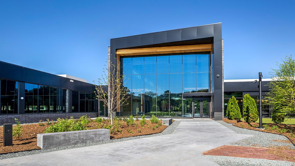 A building with a glass front.