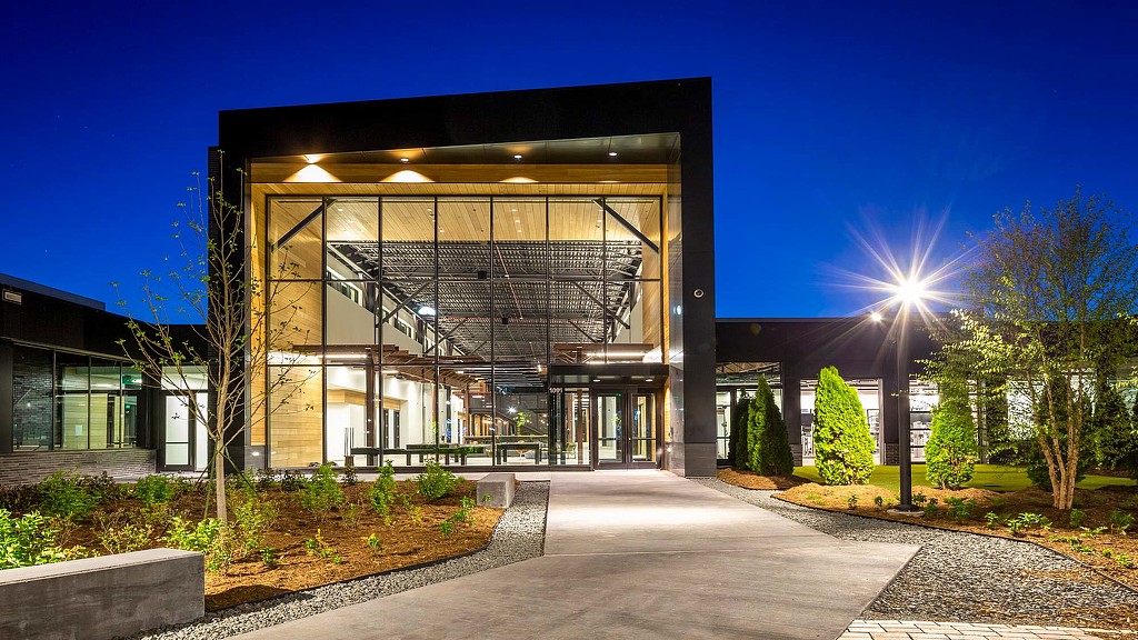 A building with a glass front.