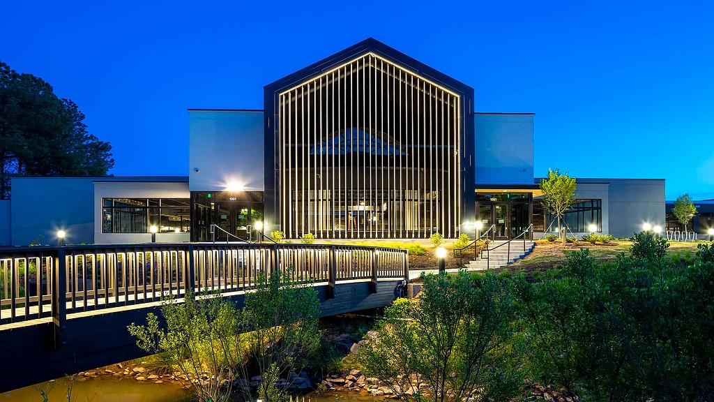 A building with a glass front.