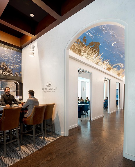 Real Agave tequila bar and arched hallway.