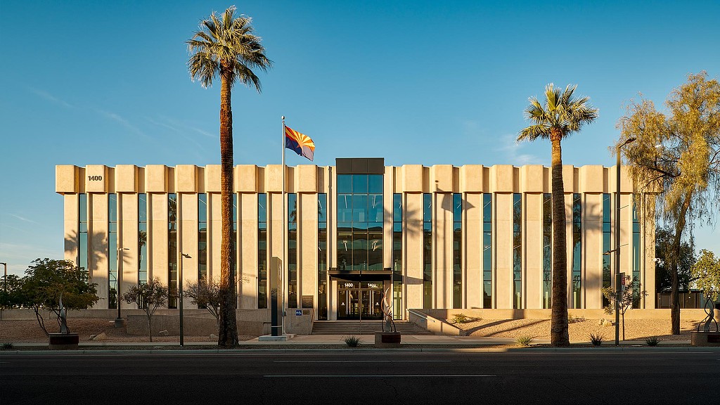 Arizona Department of Administration building exterior with palm trees.