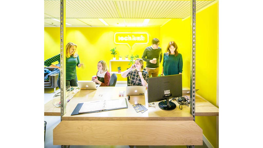 A group of people in a room.