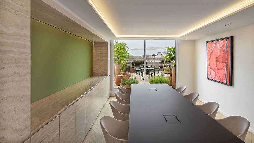 Confidential Paris client conference room with outdoor terrace.