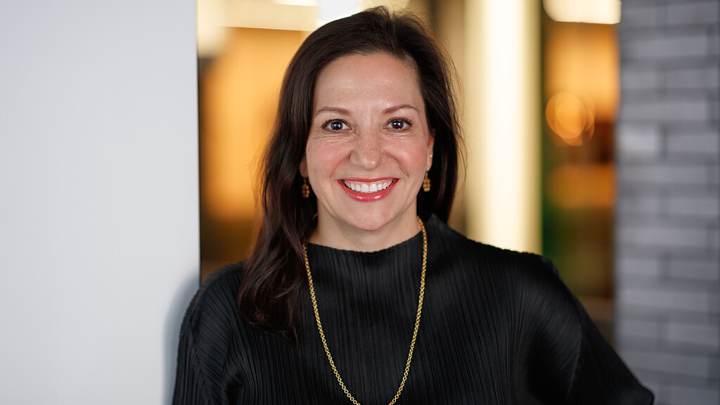 A person smiling for the camera.