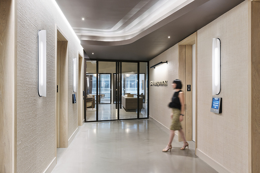 A person standing in a hallway.