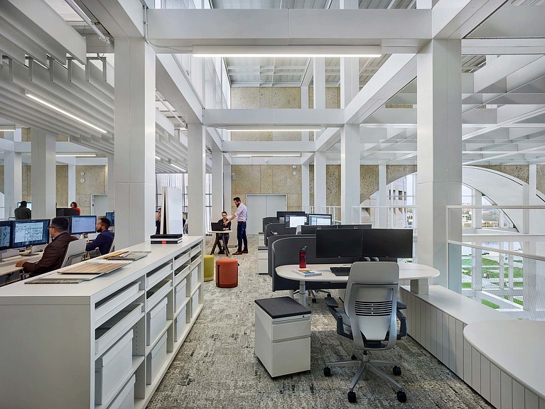 A group of people in an office.