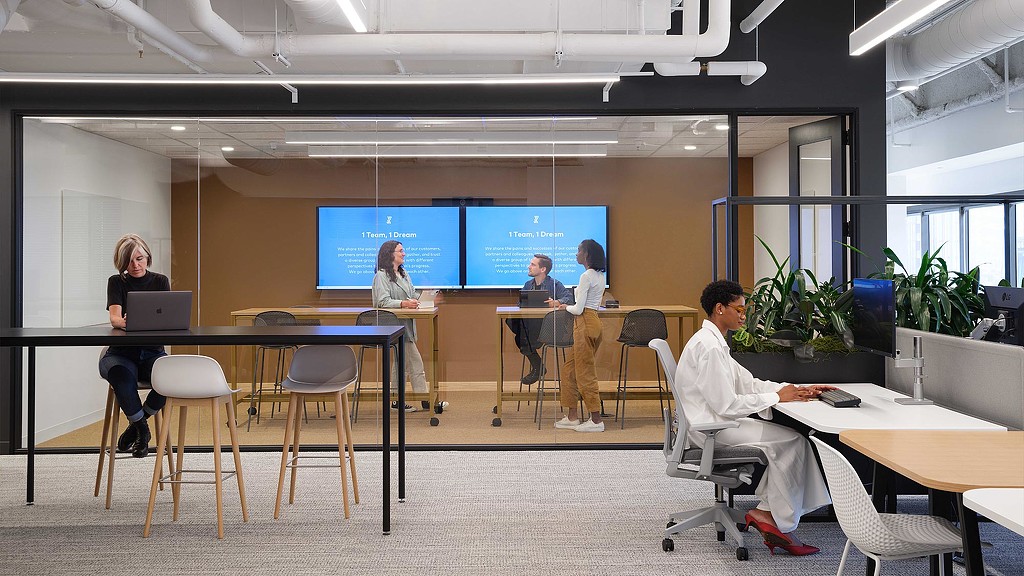 Fivetran headquarters meeting room with digital screens.