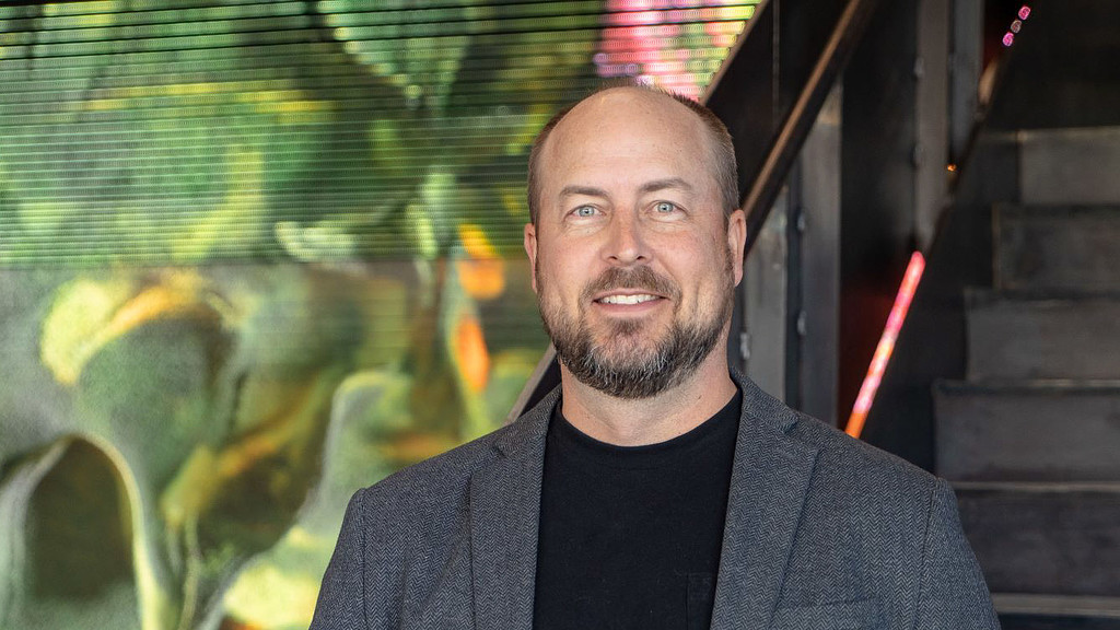 A man smiling for the camera.