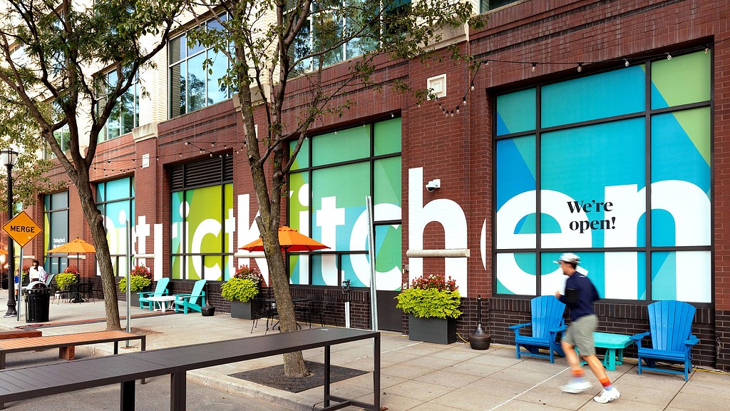 Harborside District Kitchen graphic on building windows.