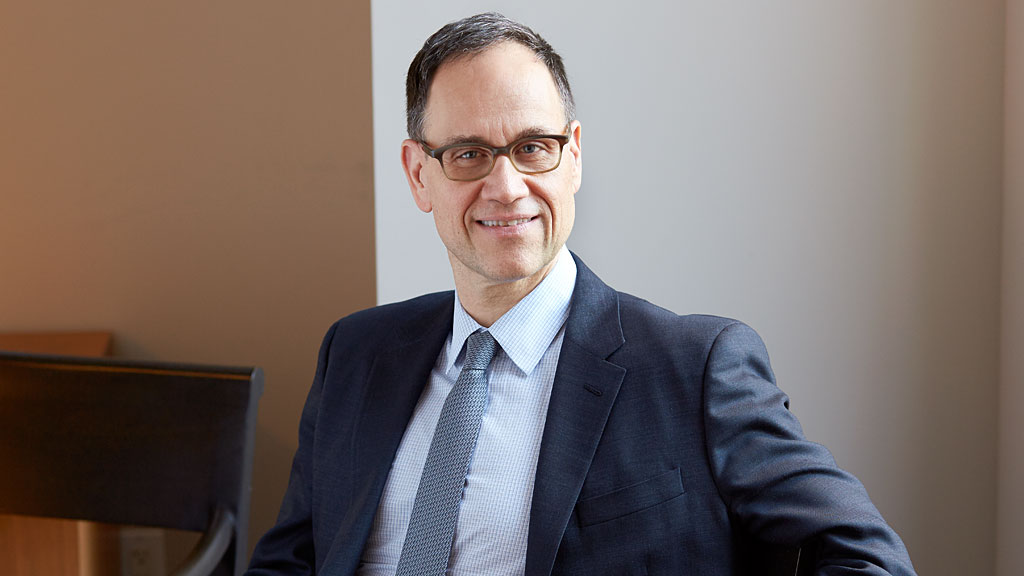 A man wearing a suit and tie.