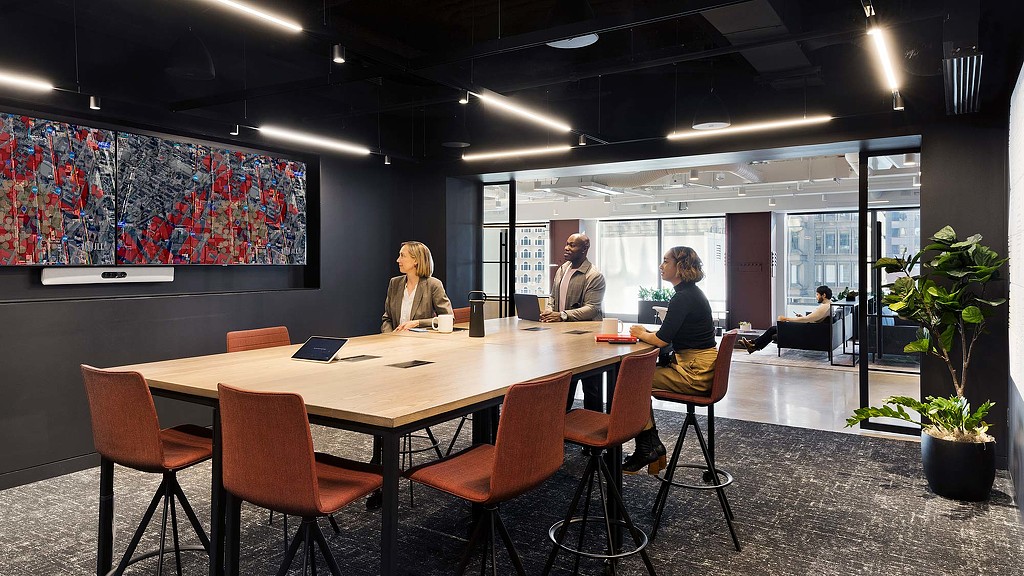 Closed collaboration space, conference room at JLL workplace