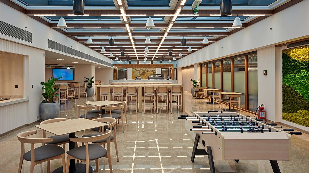 Financial services workplace cafe with foosball table