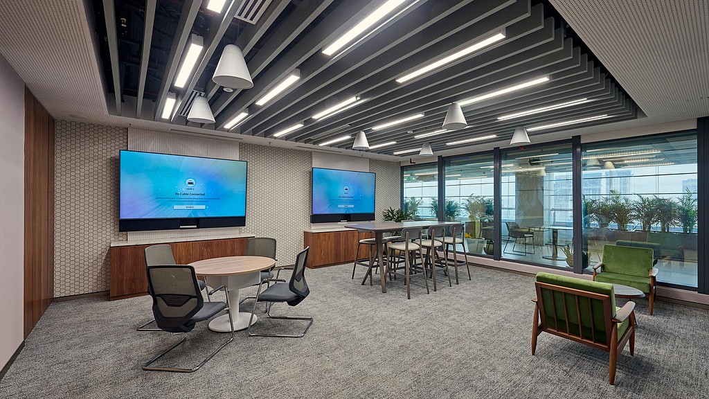 Financial services meeting room with two screens