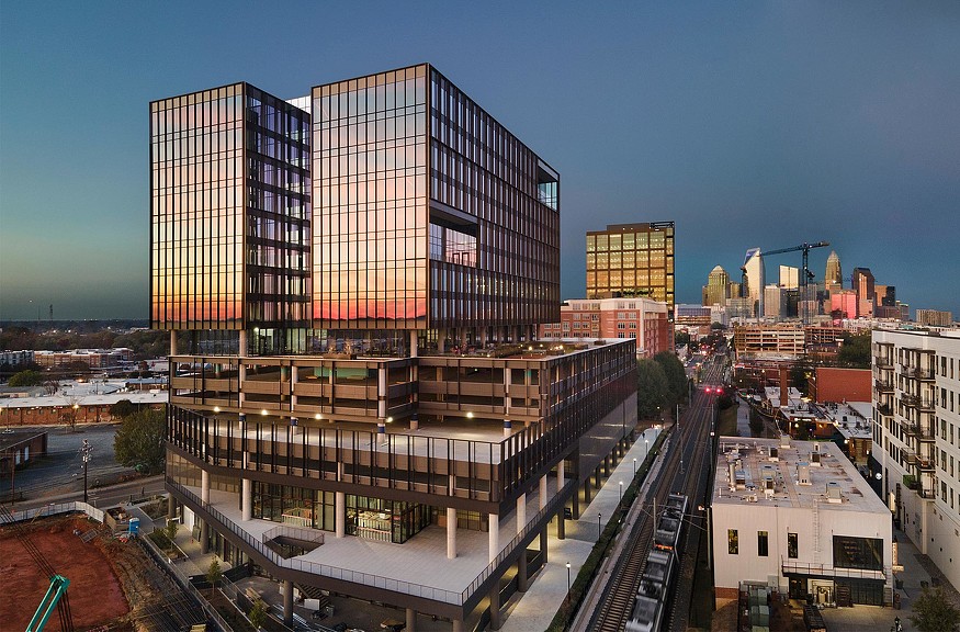 The Line Charlotte building exterior at dusk