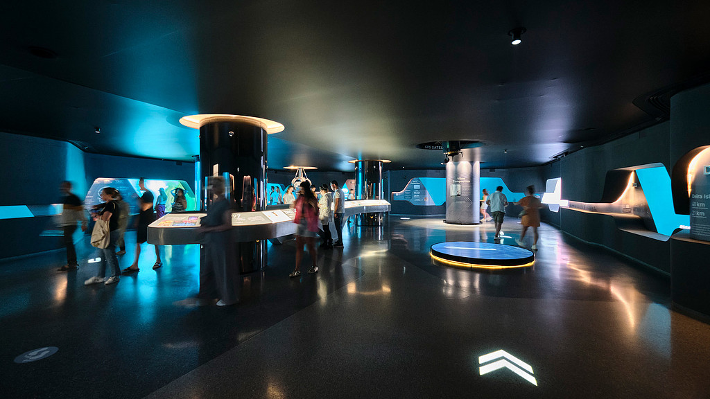 A group of people in a room.