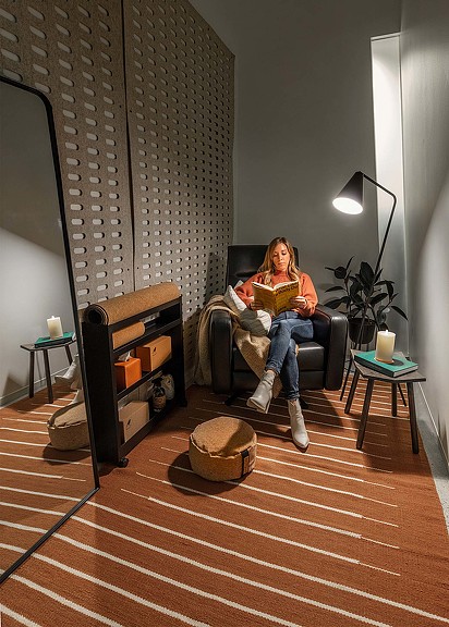 A person sitting in a chair.