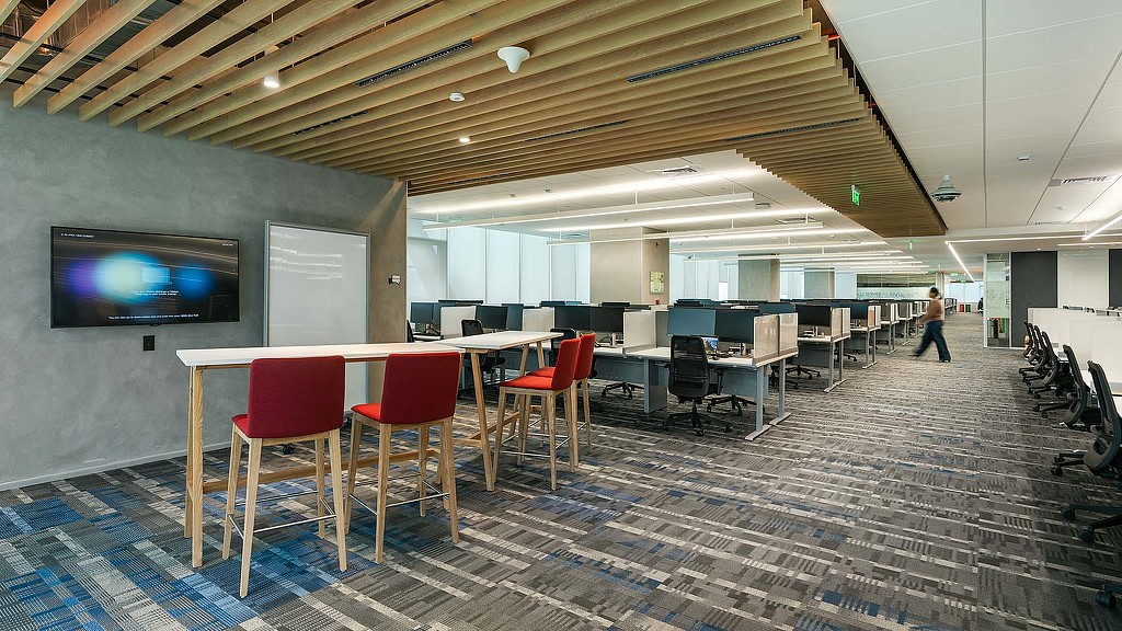 A room with tables and chairs.