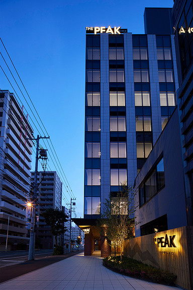 The Peak Sapporo office building nighttime street view