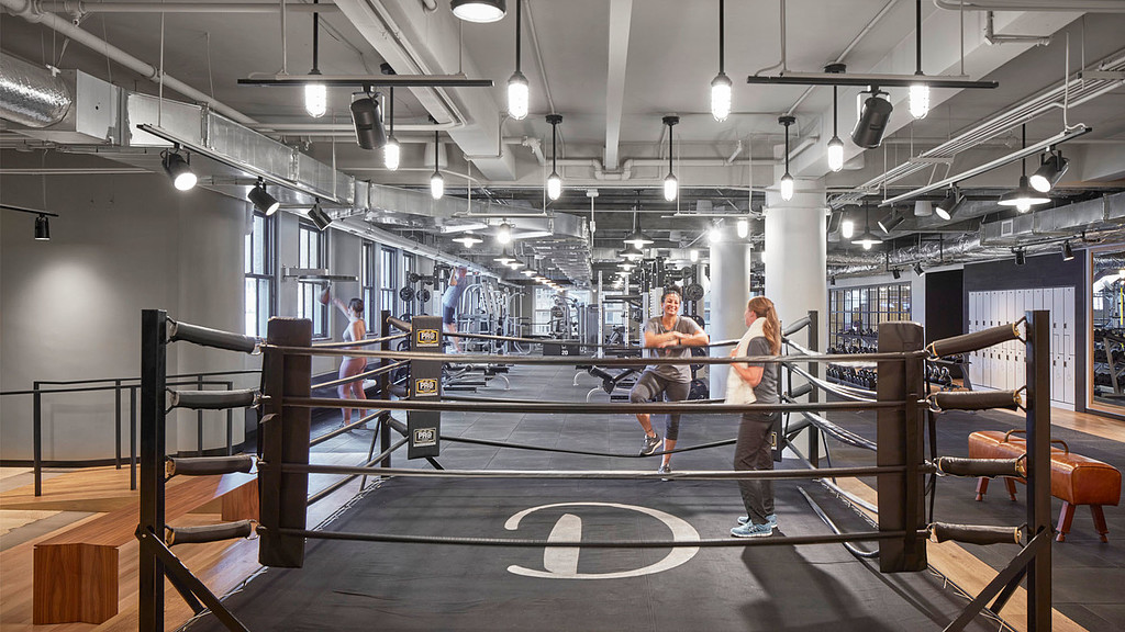 A group of people in a gym.