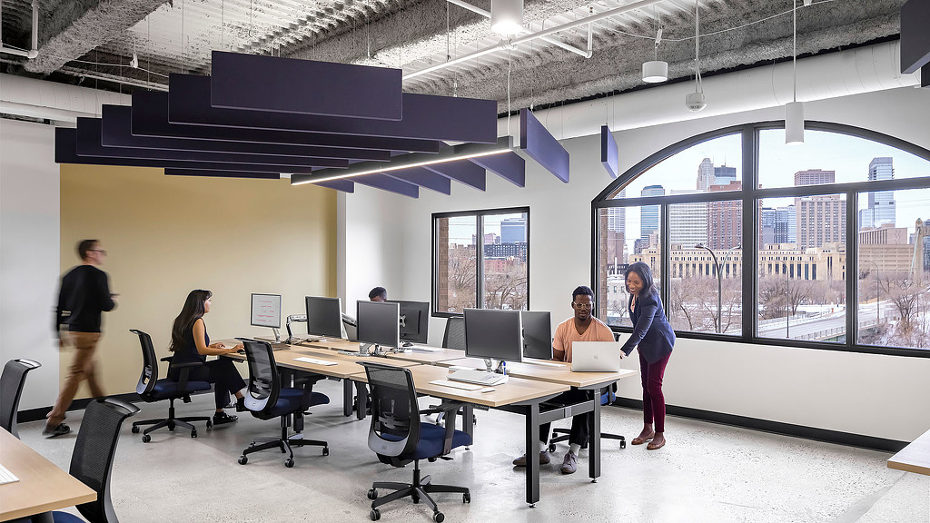 People working in an urban office space