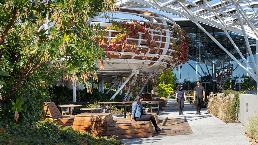 People walking around a greenhouse.