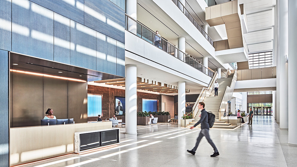 A person walking down a hall.