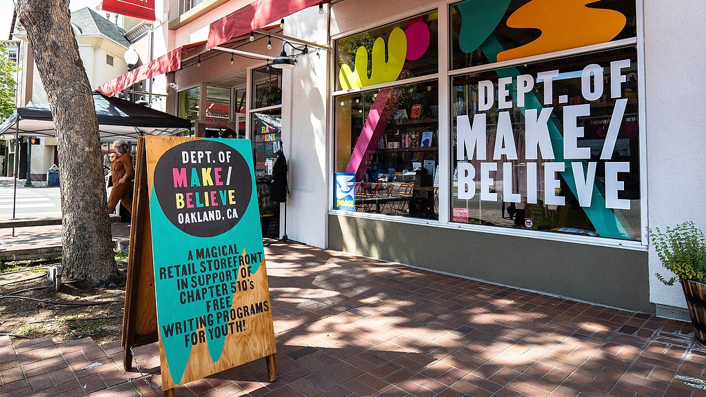 Chapter 510 Swan's Market Dept of Make Believe writing center with A-frame sign