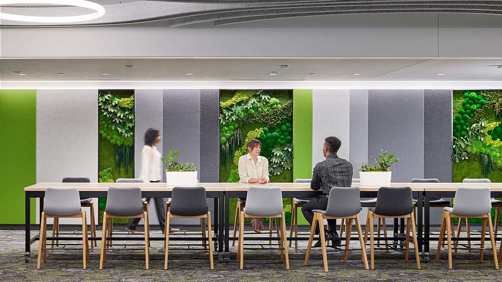 A group of people sitting at a table.