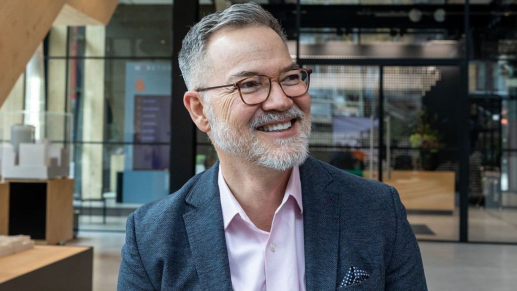 A man wearing glasses.