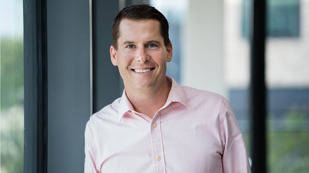 A man smiling for the camera.