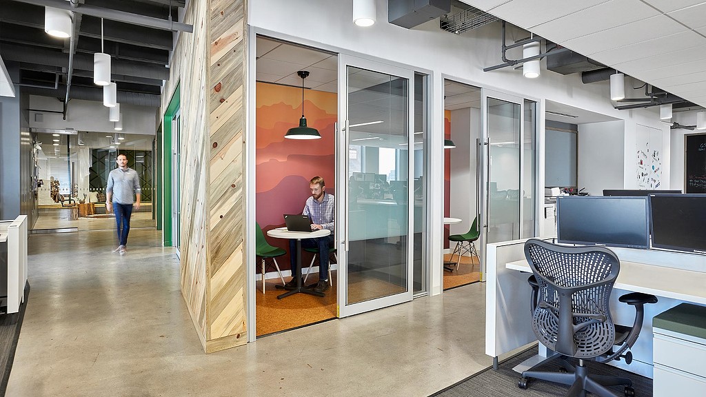 Travel technology client private meeting rooms and hallway