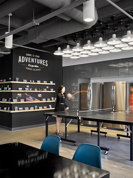 Travel technology client amenity space with ping pong table