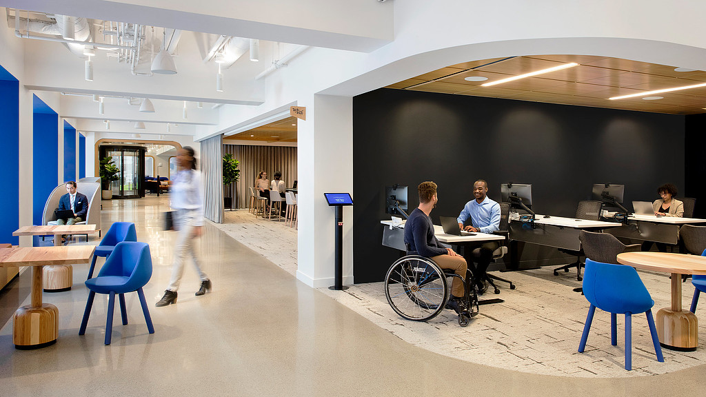 Seating areas in an open hallway at United Airlines lounge