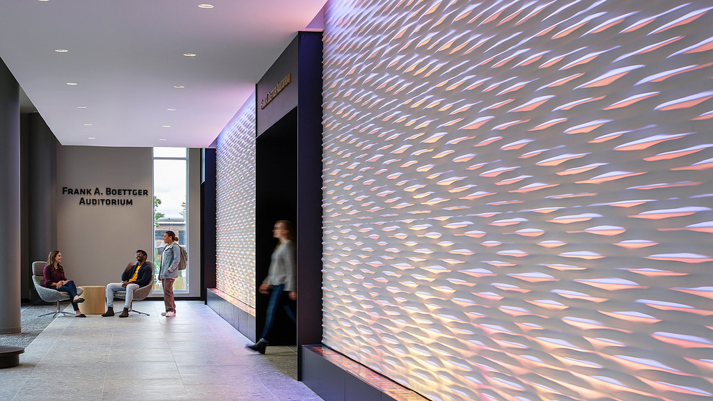 Environmental graphic design wall at Wichita State University Business School in Kansas