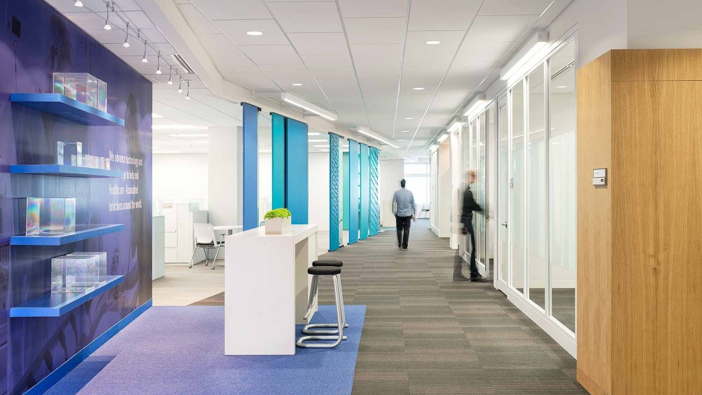 A long hallway with blue walls.