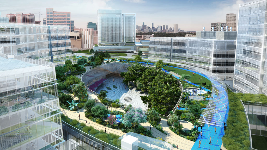 A large courtyard with a fountain and buildings in the background.